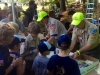 The Steve\'s help the Scouts build their slides.